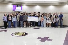 Jacksboro High School Collegiate Prep Advisor Hillary Deffebach and her sophomore professional communications dual credit class accept a $6,000 grant from the Jacksboro Education Foundation. Photo/Ashley Anderson