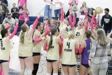In a history-making moment, the Perrin-Whitt volleyball team sweeps the Newcastle Ladycats in three sets to claim the district title. The Lady Pirates celebrated seniors before the final home game on Tuesday, Oct. 21, then went on to remain undefeated in their district run. Photo/Ashley Anderson