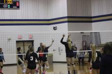 Savannah Burkett taps the ball over for a point at the Lady Pirate’s senior night Oct. 29 against Graford. Photo/Trevor M. Wyatt