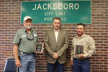 City of Jacksboro Water Supervisor Robert Tomison, City Manager Mike Smith and Mayor Alton Morris display the plaques Jacksboro won in the 2017 Big Country Drinking Water Contest.