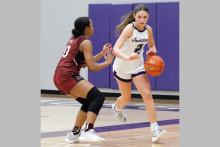 Kolbi Rockey drives past a defender Tuesday, Jan. 20 against the Vernon Lady Lions. Rockey delivered 11 points on the night and was one of three Tigerettes to score in the double digits against the Lady Lions. Photo/Ashley Anderson