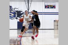 Callie Weddle drives past a defender for a layup attempt during one of the Lady Pirates tournament matches. Weddle was a frequent top scorer for the Lady Pirates in their tournament wins Thursday, Nov. 20 through Saturday, Nov. 22. Photo/Ashley Anderson