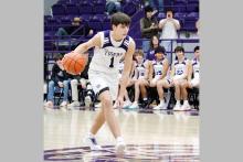Brayden Rockey takes the ball past halfcourt Thursday, Jan. 29 against the Bowie Jackrabbits. Rockey led the way in scoring for the Tigers with 20 points in their 67-32 win. Photo/Ashley Anderson