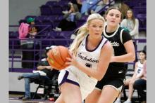 Hayden Walker drives past a defender Friday, Dec. 19. Walker will continue her basketball career going into college after committing to Oklahoma Christian University. Photo/Ashley Anderson