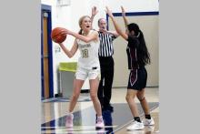 Kadie Dugan looks to inbound the ball to a teammate Friday, Dec. 19 against the Lingleville Lady Cardinals. The Lady Pirates picked up a dominant 52-14 victory. Photo/Ashley Anderson