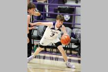 Tyler Roberts makes a cut to the basket Tuesday, Dec. 2 against Tolar. The Tigers stayed in control and beat the Rattlers 62-54 in the contest. Photo/Ashley Anderson