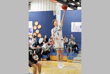 Wiett Newton lays the ball up Friday, Feb. 6 against the Woodson Cowboys.  Newton is one of the graduating seniors for the Cowboys and had 16 points on the night in Bryson’s 59-34 win. Photo/Ashley Anderson
