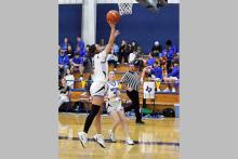 Jaydah McComack puts up a layup Friday, Jan. 16 against the Newcastle Ladycats. McComack scored two points in the matchup against the Ladycats. Photo/Ashley Anderson