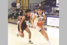 Brayden Rockey drives past a defender in one of the Tigers’ 2024 matchups. Rockey led the way in scoring on the night for the Tigers with 32 points in a season opening 60-36 win Tuesday, Nov. 18 over the Archer City Wildcats. Archive photo