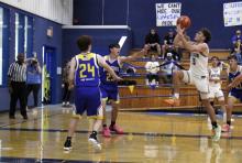 Caleb Allen rises up for a layup in one of the Cowboys’ previous matchups. The Cowboys participated in the Thackerville Red River Classic which took place from Thursday, Dec. 11 to Saturday, Dec. 13. Photo/Ashley Anderson