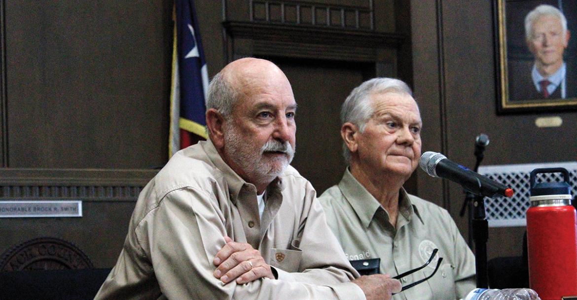 Jack County Commissioners Gary Oliver and Ronald Fitzgerald listen to public comments Monday, June 8 regarding the rescheduling of a public hearing to designate a reinvestment zone and consider a tax abatement agreement with CyrusOne. The hearing was rescheduled for Monday, July 27 but no action would be taken unless all members of the court were present. Photo/Ashley Anderson