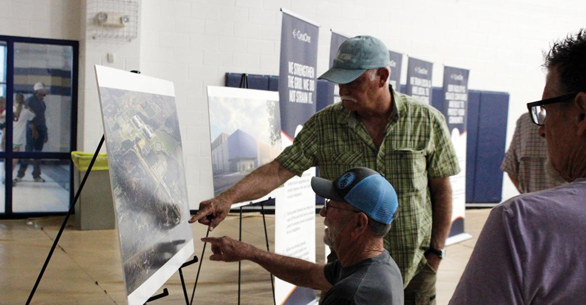 Local residents point at a map Thursday, May 28 at a community meeting in Perrin held by CyrusOne. The county will consider in July designating a reinvestment zone and approving a tax abatement agreement for the construction of a data center campus in southeastern Jack County. Photo/Ashley Anderson